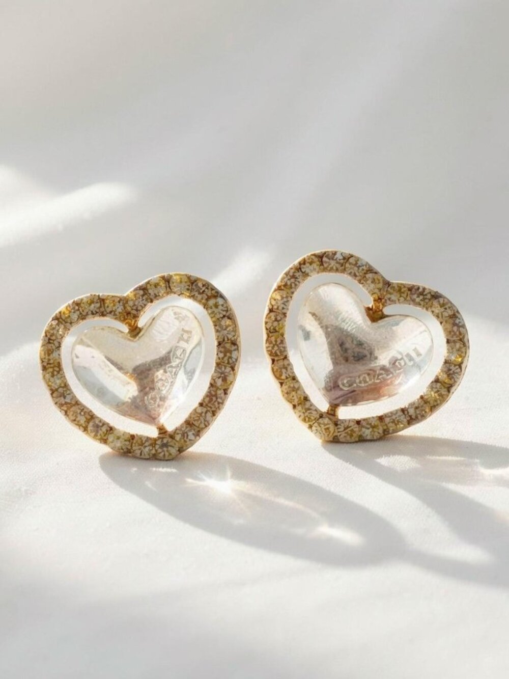 Coach heart earrings with gold-tone heart-shaped